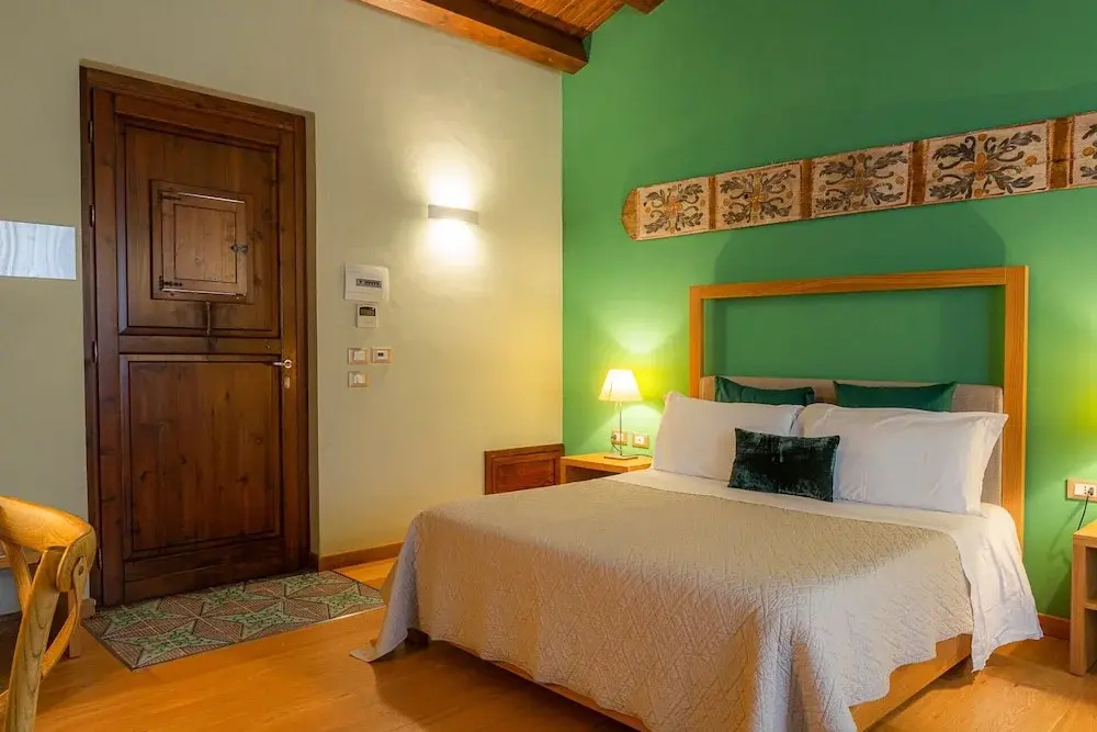 Superior Triple room with garden view