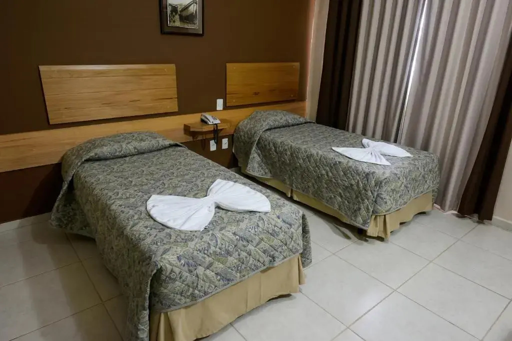 Prisma Plaza Hotel - Chambres