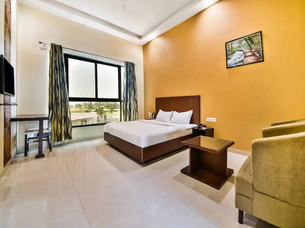 Hotel Amrit Manthan - Chambres