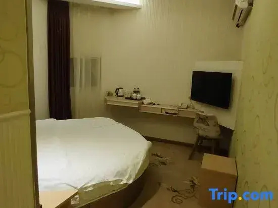Huatian Hotel - Chambres