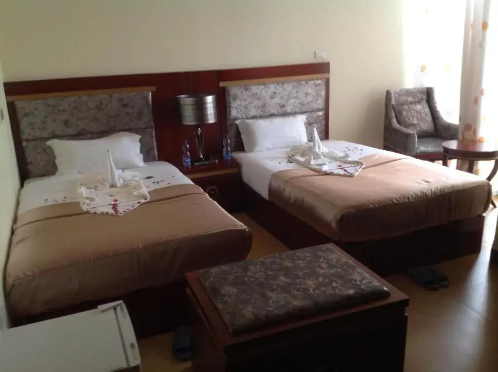 Palm Palace Hotel - Chambres