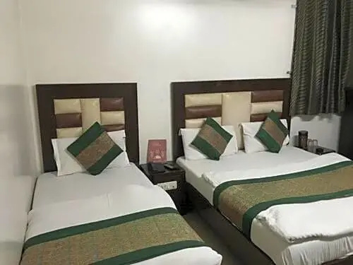 Hotel Sai International - Chambres