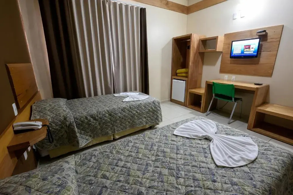 Prisma Plaza Hotel - Chambres