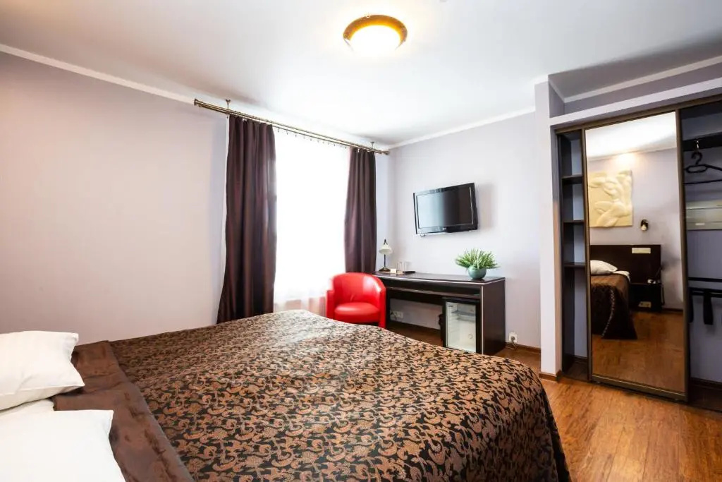 Primo Hotel - Chambres