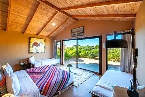 Standard Quadruple room with garden view