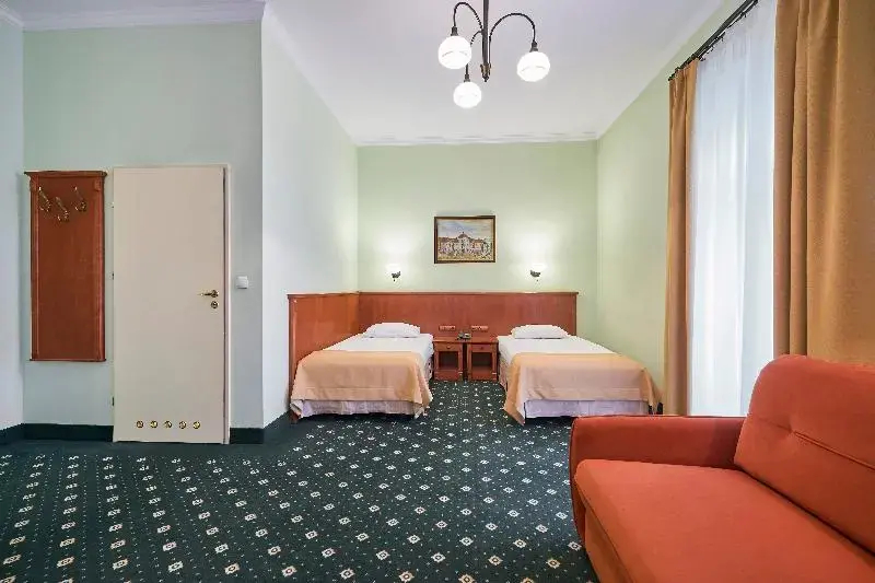 Hotel Hetman - Tap to explore photos