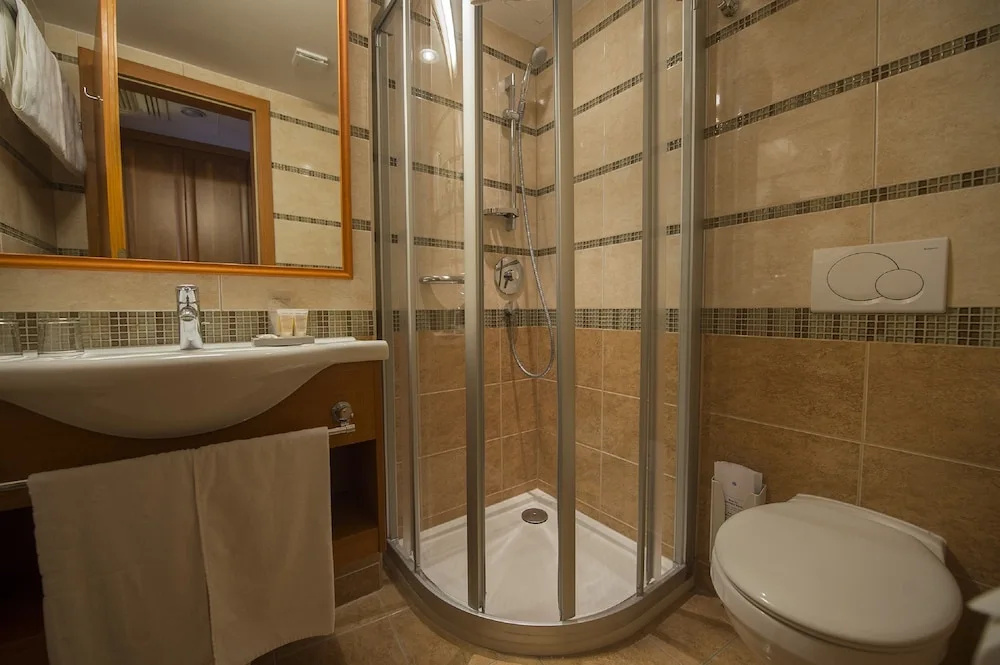 Three Corners Hotel Art - Chambres