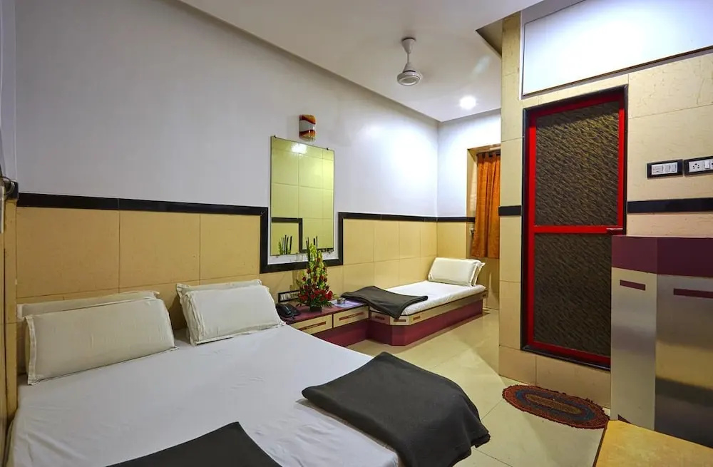 Hotel Swapna International - Chambres
