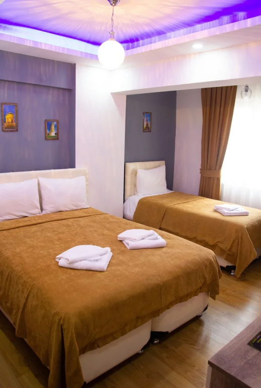 Standard Triple room with balcony