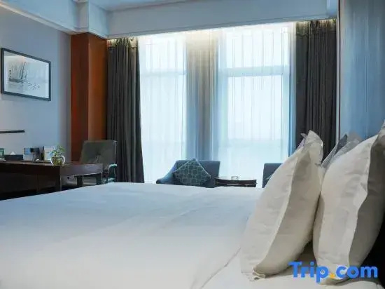 Jiyuan Oriental Jianguo Hotel - Chambres