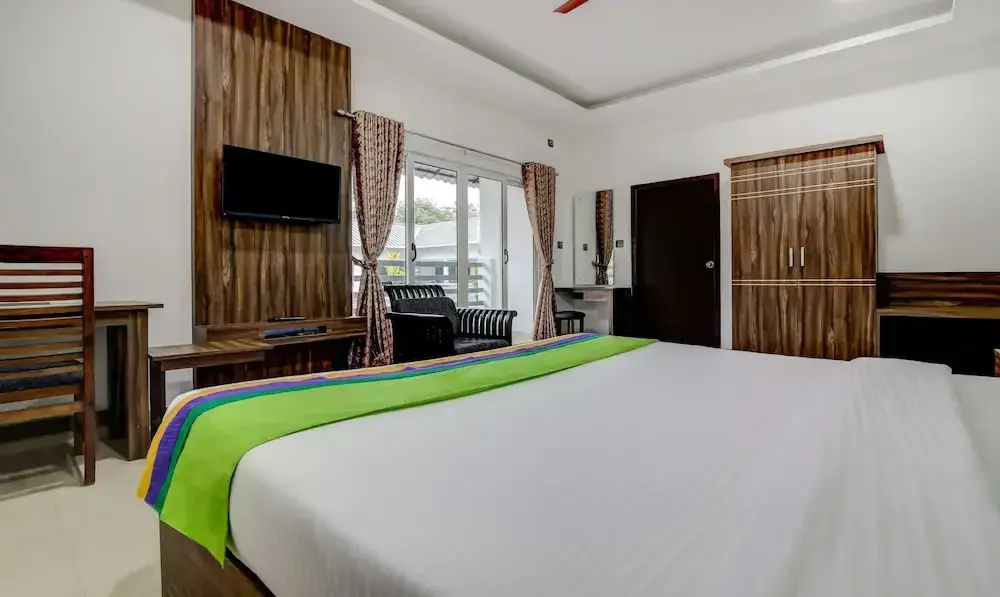 Treebo Misty Garden Resorts & Spa with Swimming Pool - Chambres