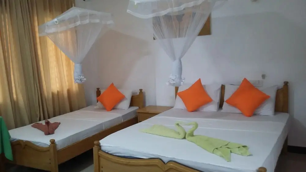 Oasis Beach Resort - Chambres