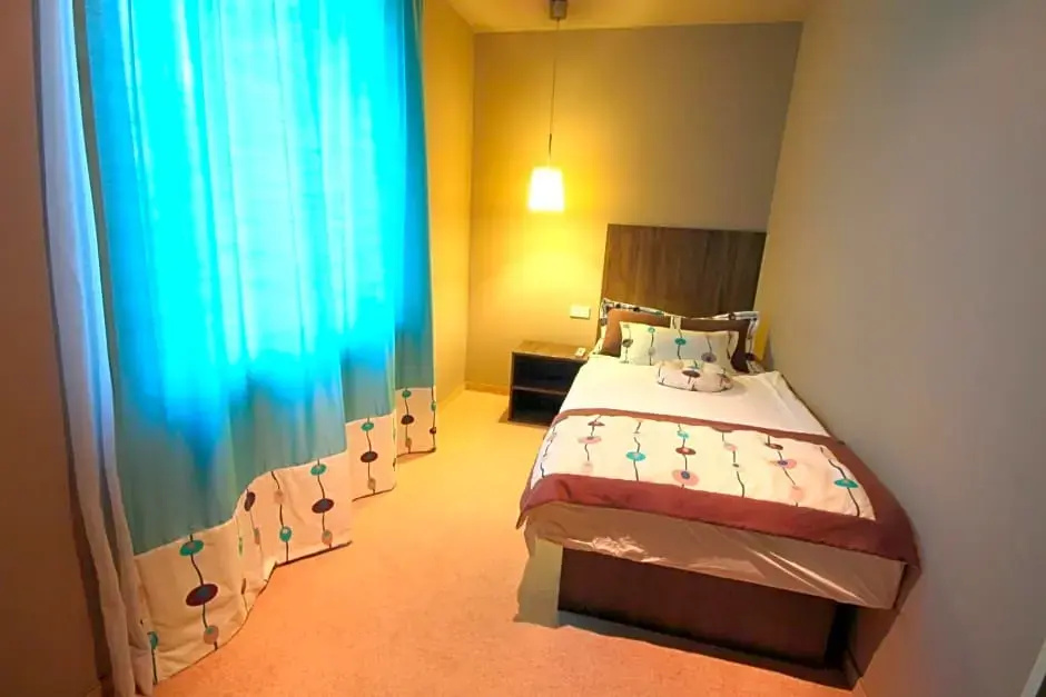 Ambient Hotel - Chambres