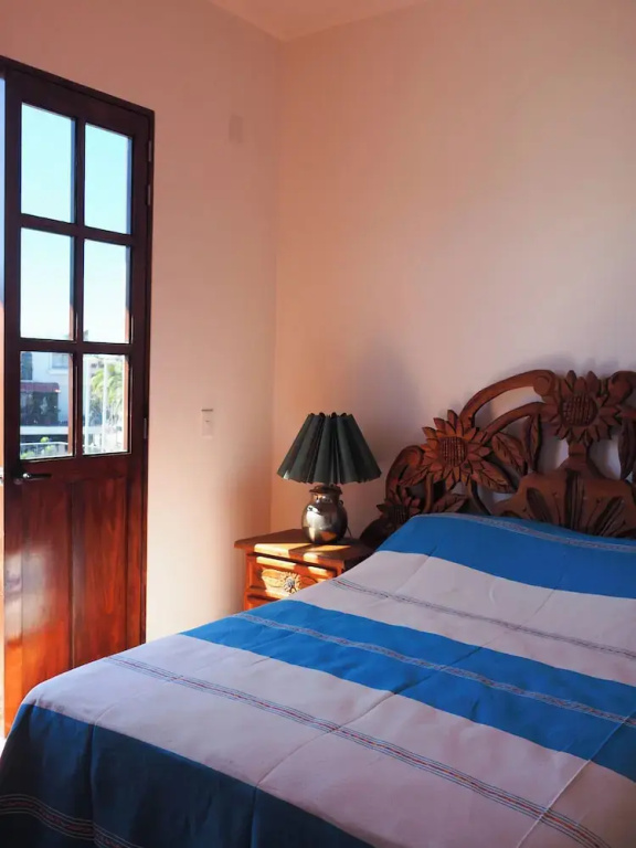 Comfort room with balcony and with city view