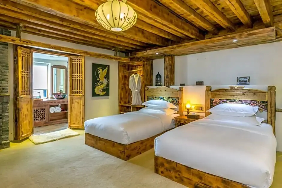 Lijiang E-Outfitting Boutique Hotel - Chambres