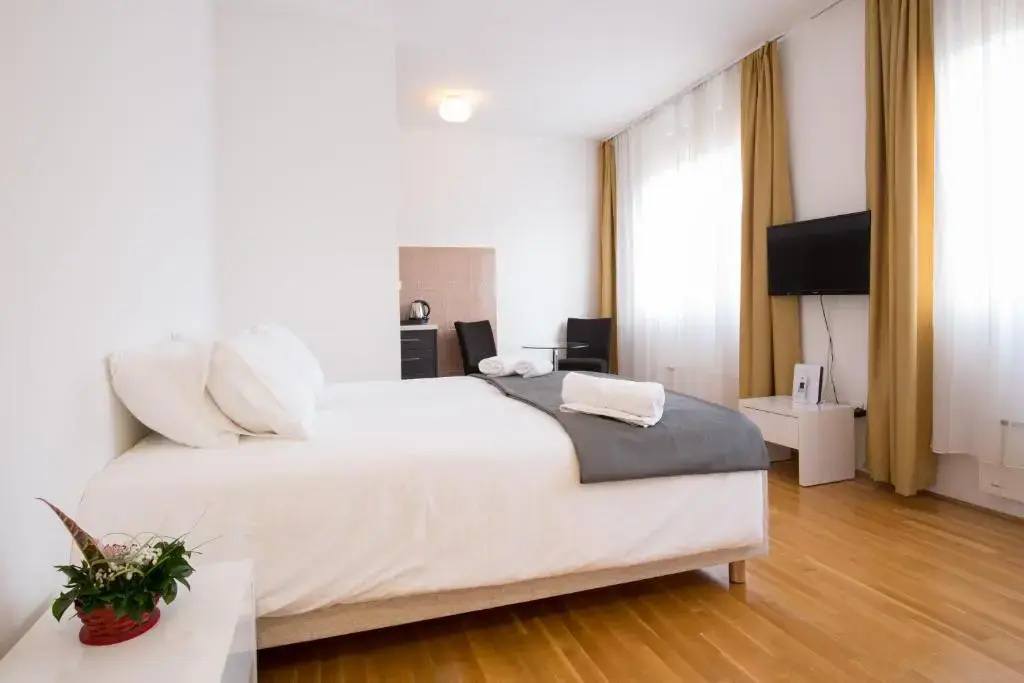 Nova City Hotel Signature Collection - Chambres