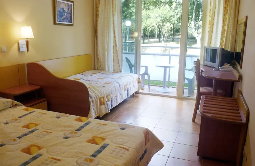 Com Hotel - Chambres
