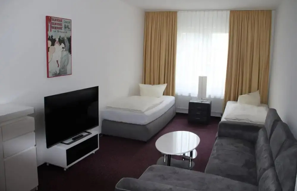 Check Inn Hotel - Chambres