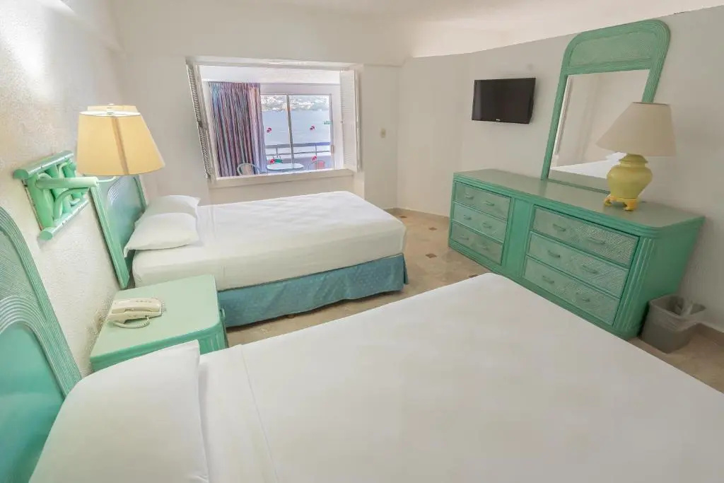 Playa Suites Acapulco - Chambres