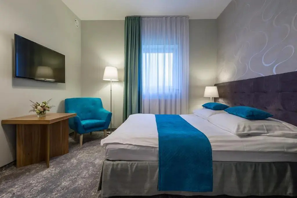 Patio Hotel - Chambres