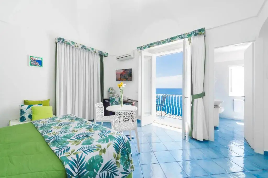 Superior Double room with balcony and with sea view (full double bed)