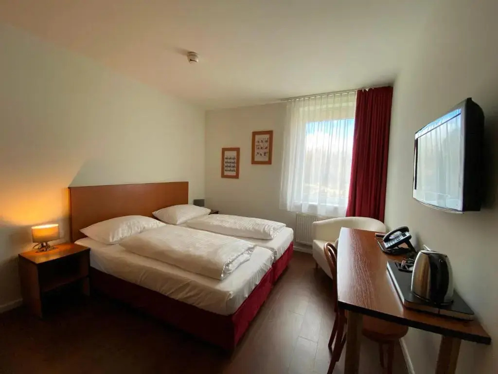 Amedia Express Sattledt a Trademark by Wyndham - Chambres