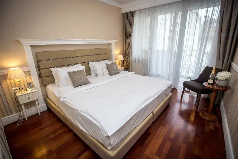 Queen's Court Hotel & Residence - Chambres