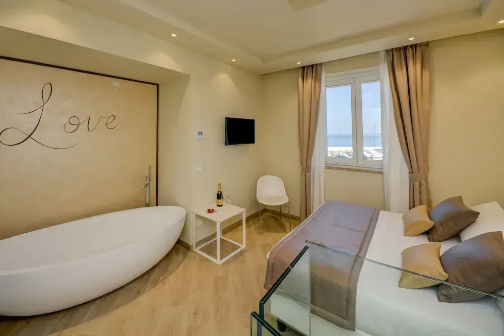 Villa Garuti Hotel & Appartements - Chambres