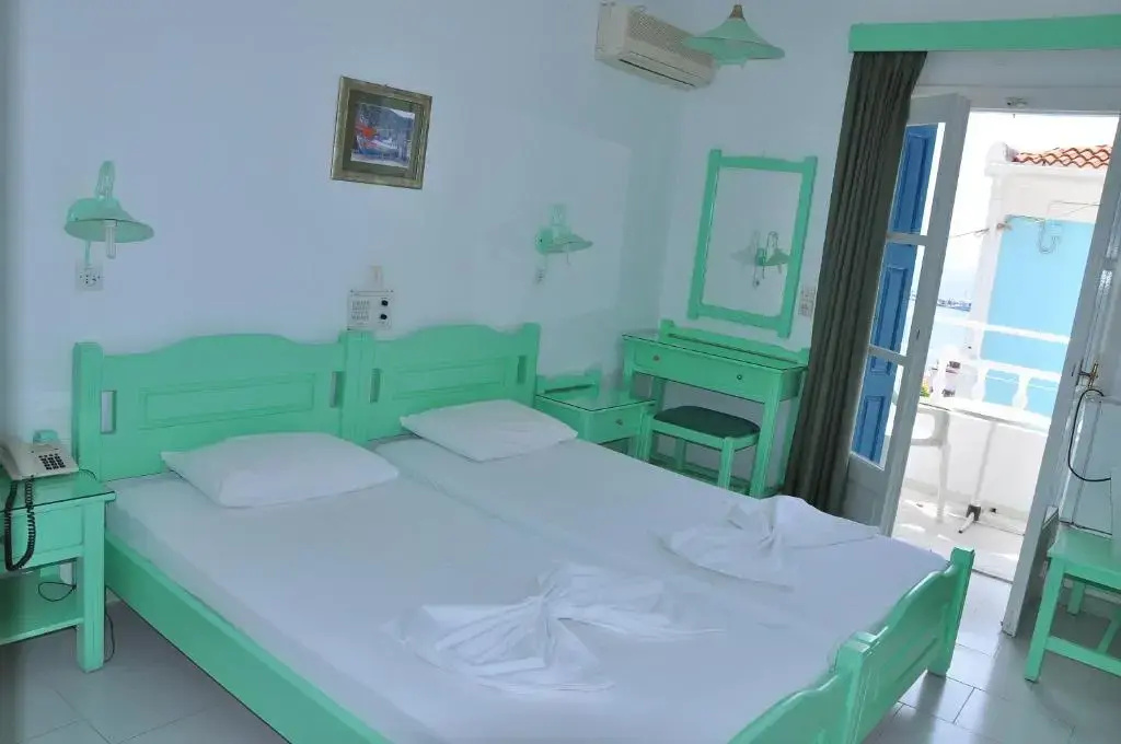 Remezzo Hotel & Studios - Chambres