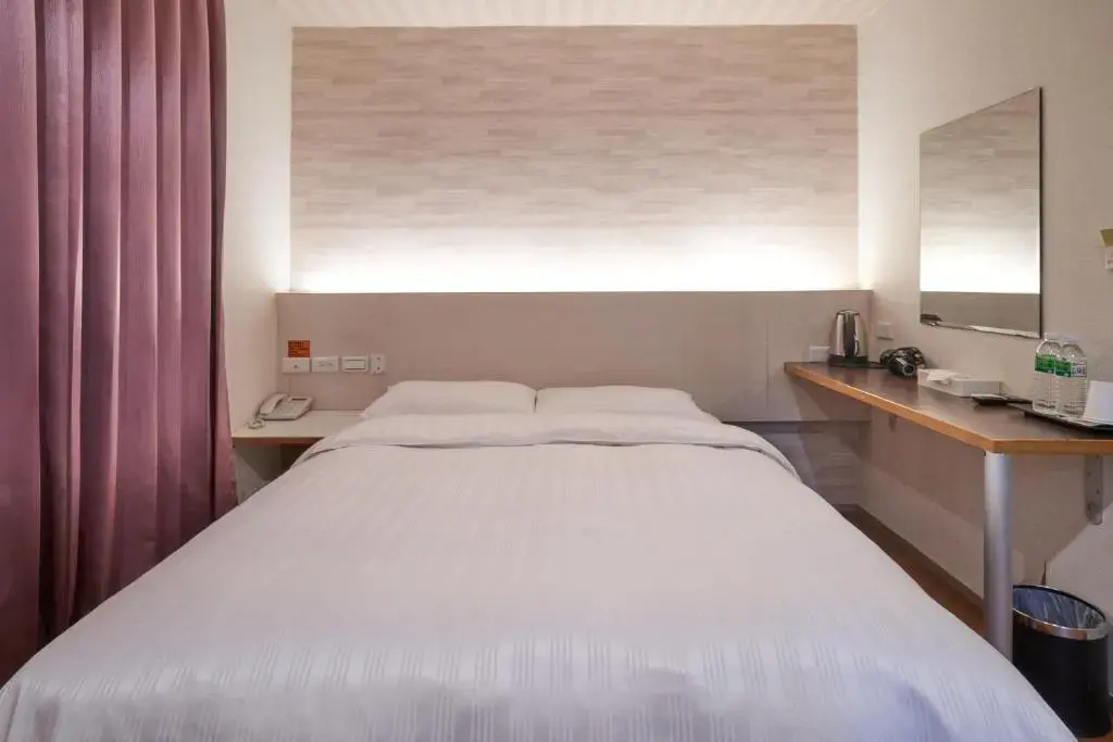 Yung An Business Hotel - Chambres