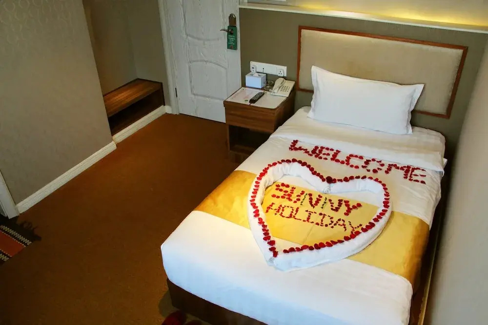 Sunny Holiday Hotel - Chambres