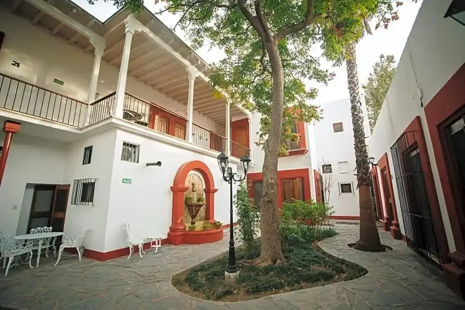Hotel Hostal El Farol - Chambres