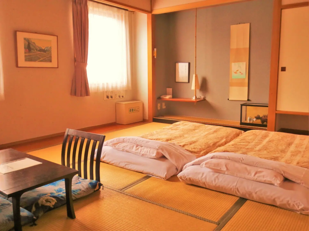 Hotel Heart Inn - Chambres