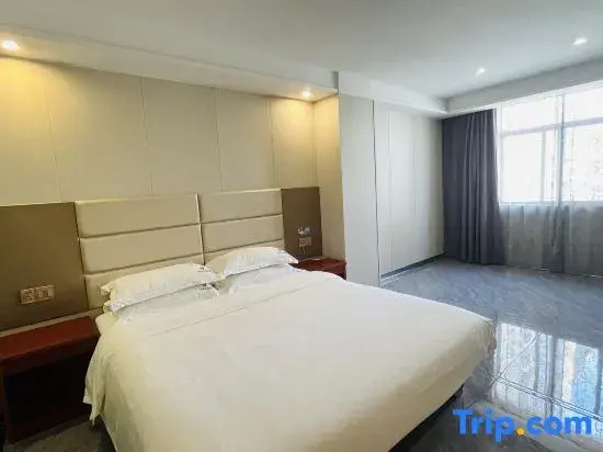 Двухместный номер Standard с видом на город двуспальная кровать в Ai Qin Hai Hotel Chain