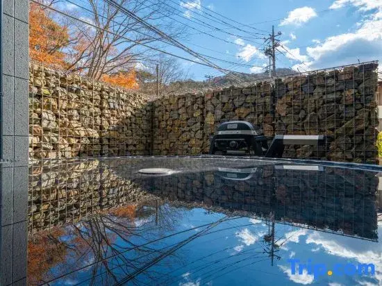 River view house with BBQ & private sauna, wood stove — designer villa with stone terrace & fire