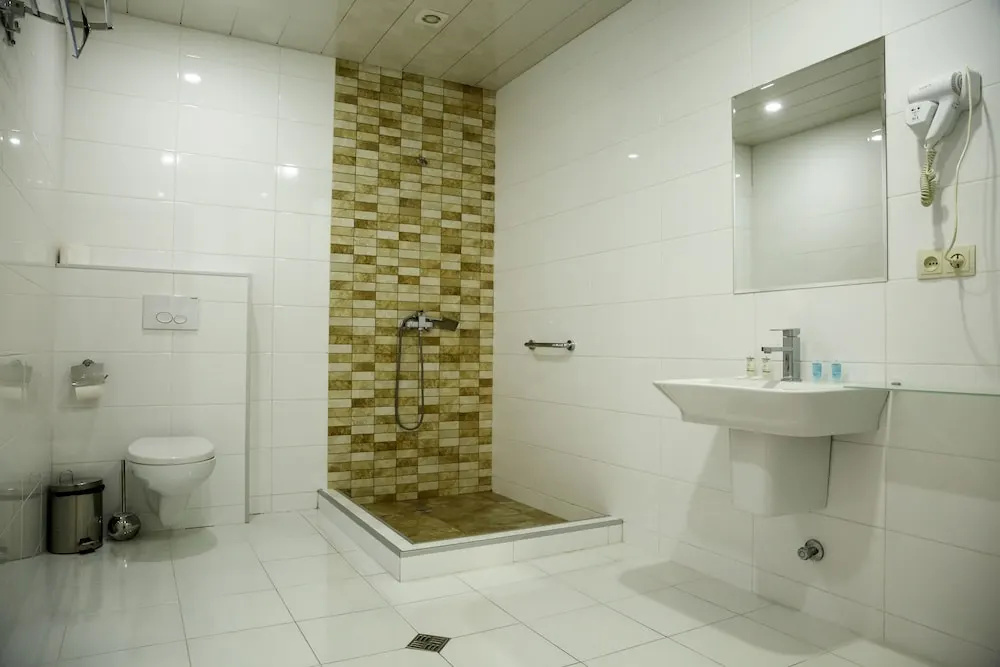 Deluxe Triple room with balcony and with city view