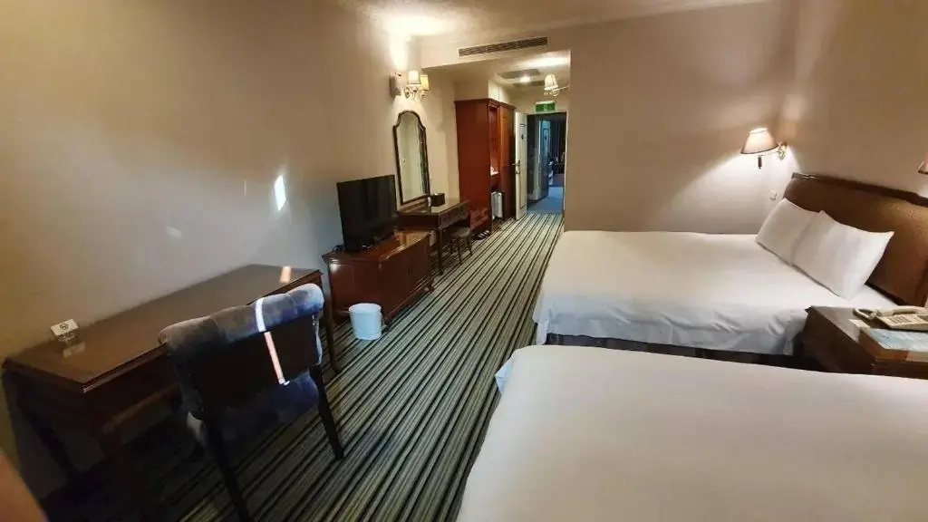 Chia Shih Pao Hotel - Chambres