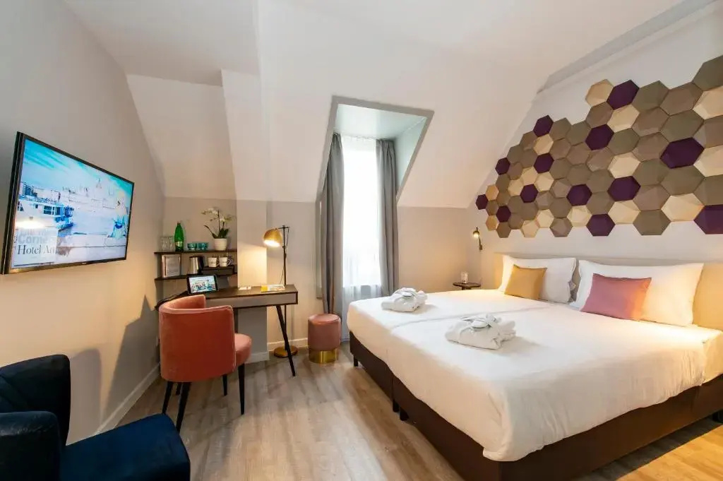 Three Corners Hotel Art - Chambres