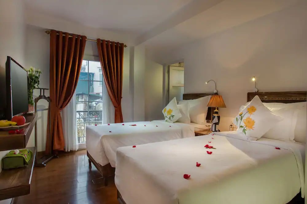 Singita Classy Boutique Hotel - Chambres
