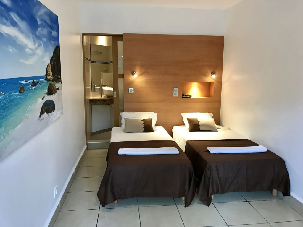 Voir la photo 4 — Karaibes Hotel