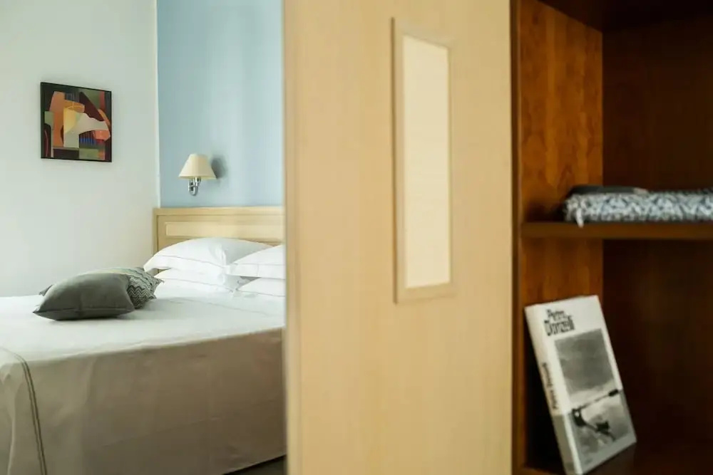 Arc en Ciel Hotel - Chambres