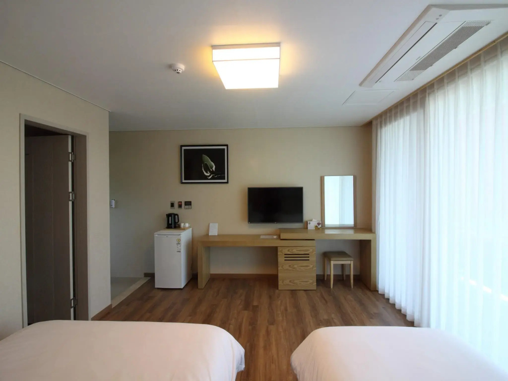 Suave Hotel - Chambres