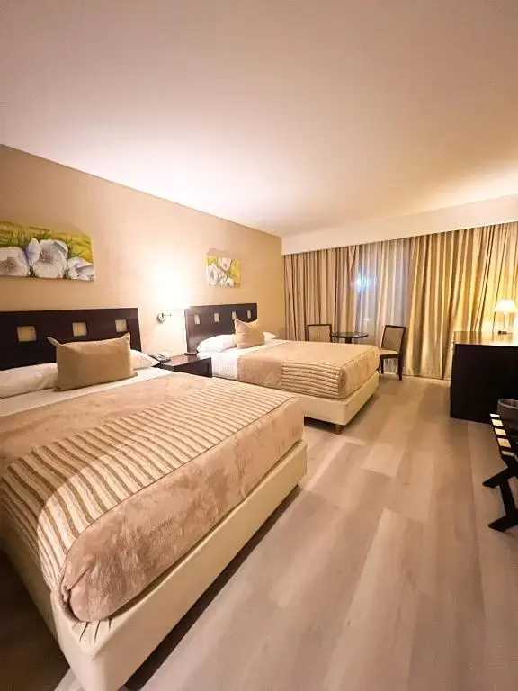 Howard Johnson by Wyndham Funes - Chambres