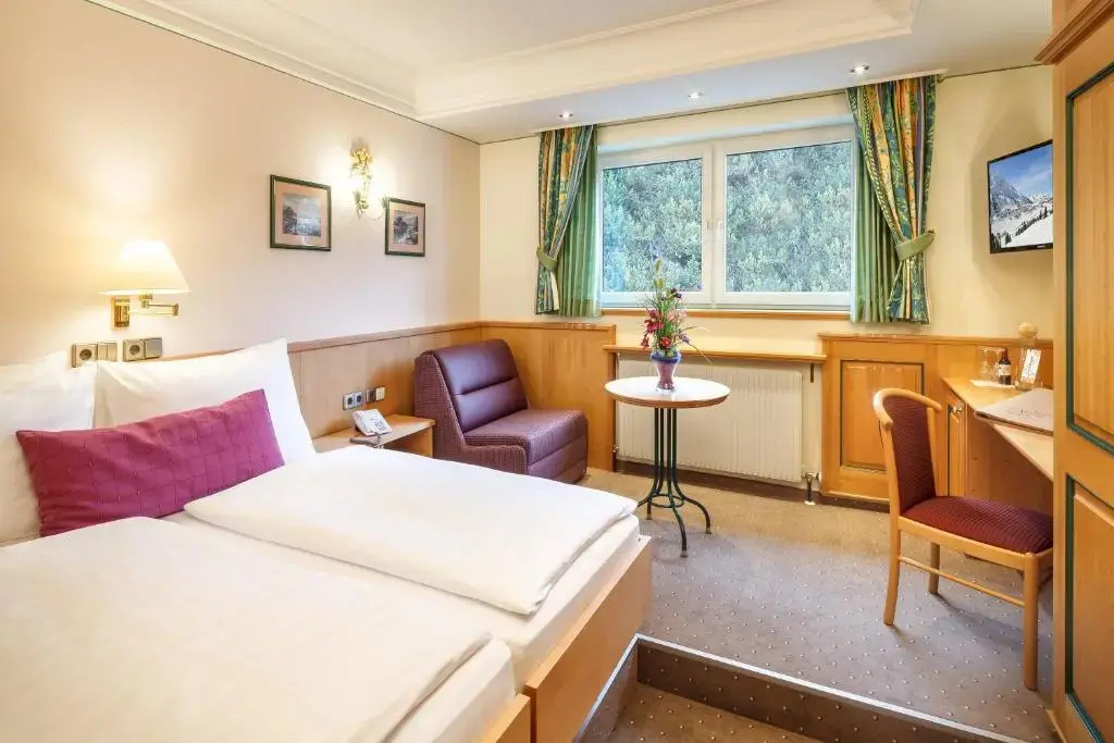 Hotel Alpina - Chambres