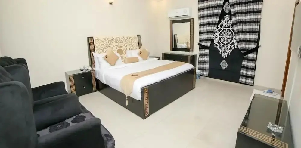 Hotel Premier Inn Grand - Chambres
