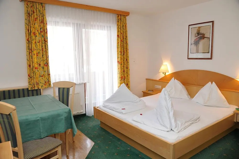 Hotel Alpina - Chambres