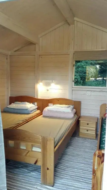 Standard Triple room with garden view
