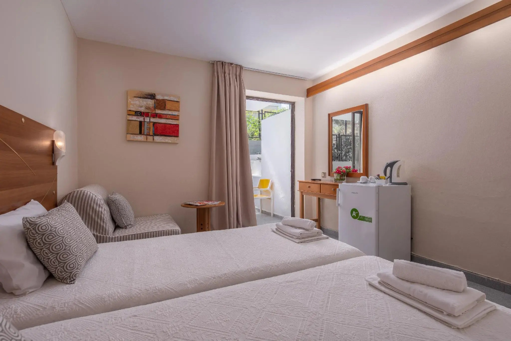 Dionysos Hotel & Suites - Chambres