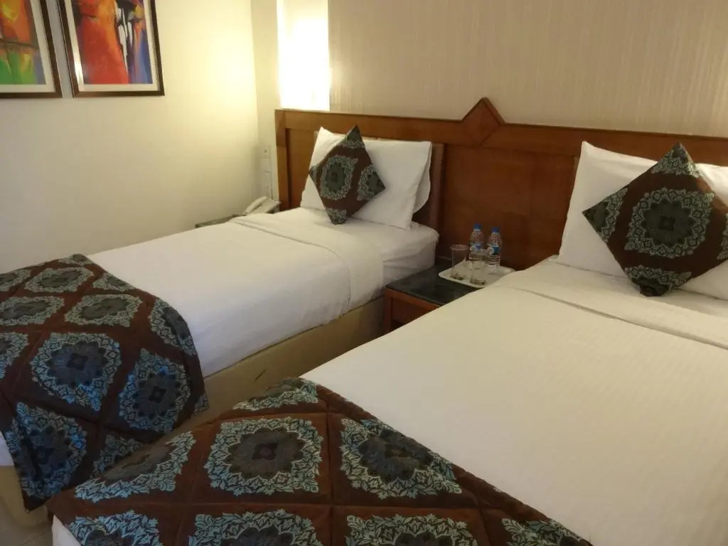 JP Cordial Hotel - Chambres