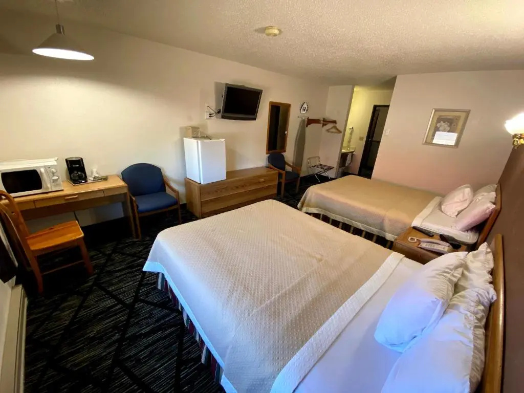 Woodlands Inn & Suites - Chambres